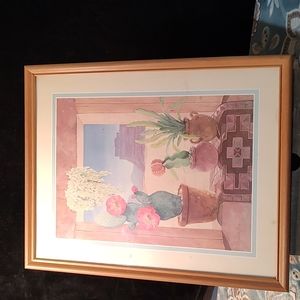 Castus in the window by Gloria Erikson?